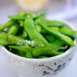 A bowl of edamame soybeans illustrating ordinary soy foods in the breast cancer article