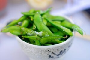 A bowl of edamame soybeans illustrating ordinary soy foods in the breast cancer article